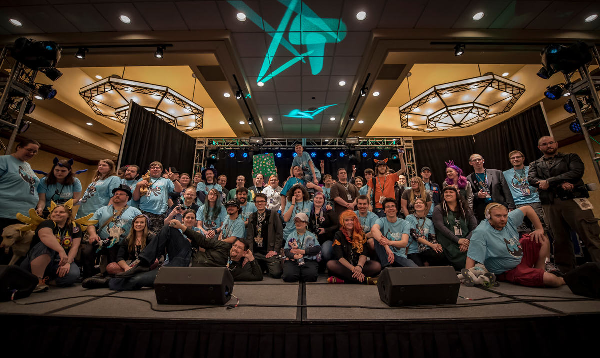 A group shot of about 40 volunteers.